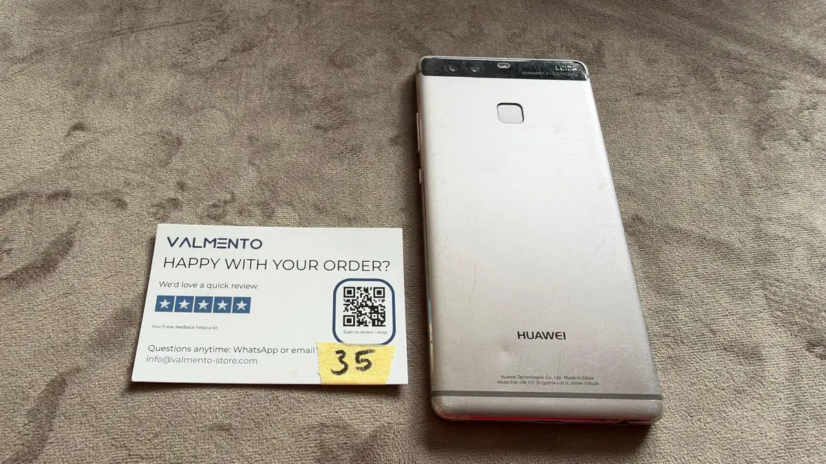Huawei P9 (EVA-L09) Silber – läuft, Deckglas gerissen – Foto 1 von 6